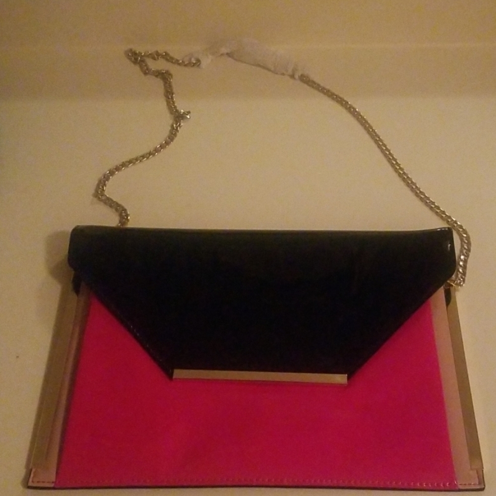 Beautiful black and red patent leather purse.